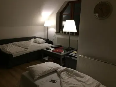 Łóżko lub łóżka w pokoju w obiekcie Studio Polanica