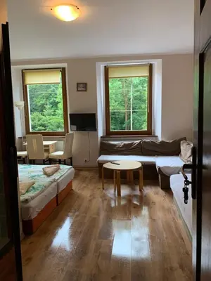 Łóżko lub łóżka w pokoju w obiekcie Apartamenty pokoje 