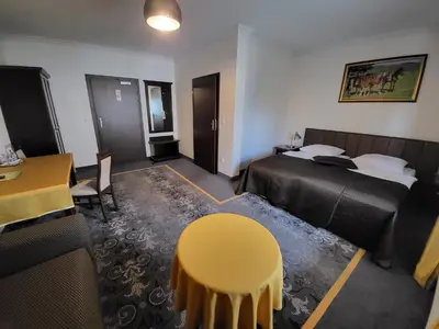 Łóżko lub łóżka w pokoju w obiekcie Na Kamieniu Hotel & Spa