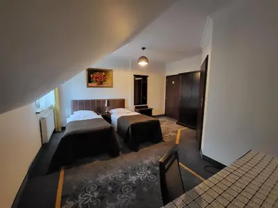 Łóżko lub łóżka w pokoju w obiekcie Na Kamieniu Hotel & Spa