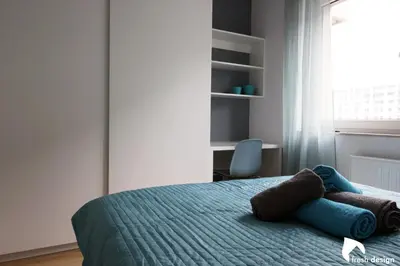 Łóżko lub łóżka w pokoju w obiekcie Apartament nad Odrą