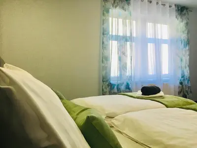 Łóżko lub łóżka w pokoju w obiekcie Gościniec Kowalova