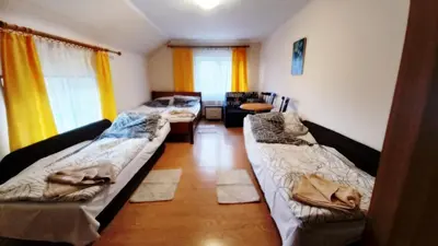 Łóżko lub łóżka w pokoju w obiekcie Agroturystyka u Joli
