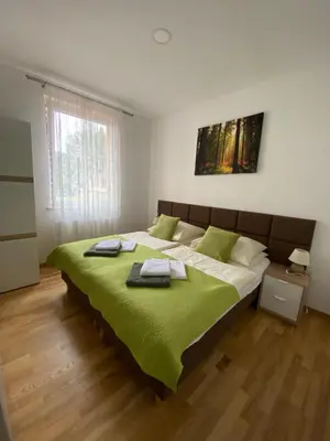 Łóżko lub łóżka w pokoju w obiekcie Apartamenty Pod Rudką Czarna Góra