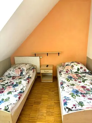 Łóżko lub łóżka w pokoju w obiekcie Hostel Nuove Frontiere