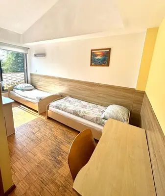 Łóżko lub łóżka w pokoju w obiekcie Hostel Nuove Frontiere
