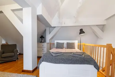 Łóżko lub łóżka w pokoju w obiekcie Apartementy Plac Solny 20