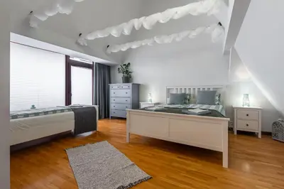Łóżko lub łóżka w pokoju w obiekcie Apartementy Plac Solny 20