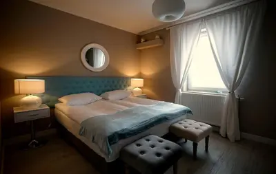 Łóżko lub łóżka w pokoju w obiekcie Happy Day Apartments