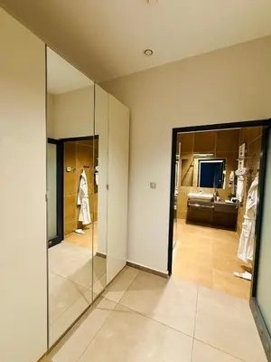 Łóżko lub łóżka w pokoju w obiekcie Jasna SportHotel & SPA