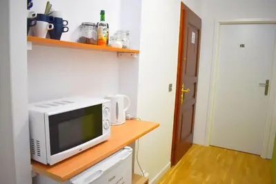 Kuchnia lub aneks kuchenny w obiekcie City Central Hostel - Pokoje prywatne