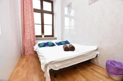 Łóżko lub łóżka w pokoju w obiekcie City Central Hostel - Pokoje prywatne