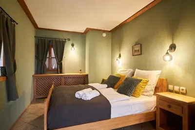 Łóżko lub łóżka w pokoju w obiekcie Vincent OldTown Apartments