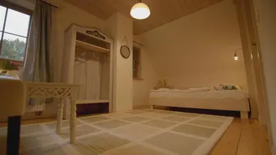 Łóżko lub łóżka w pokoju w obiekcie Dom na Końcu Świata