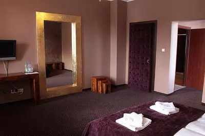 Łóżko lub łóżka w pokoju w obiekcie A' PROPOS Hotel, Restauracja, Club