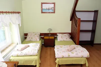 Łóżko lub łóżka w pokoju w obiekcie Hlebówka siedlisko w Sudetach