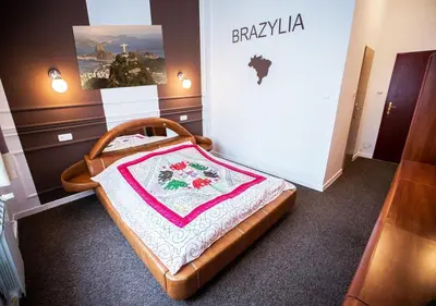 Łóżko lub łóżka w pokoju w obiekcie Hotel Granada