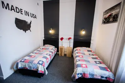 Łóżko lub łóżka w pokoju w obiekcie Hotel Granada