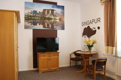 Telewizja i/lub zestaw kina domowego w obiekcie Hotel Granada