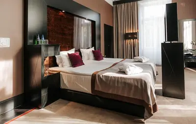 Łóżko lub łóżka w pokoju w obiekcie Platinum Palace Boutique Hotel & SPA