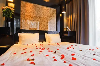 Łóżko lub łóżka w pokoju w obiekcie Platinum Palace Boutique Hotel & SPA