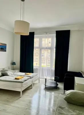 Część wypoczynkowa w obiekcie Colourful Rooms Wrocław