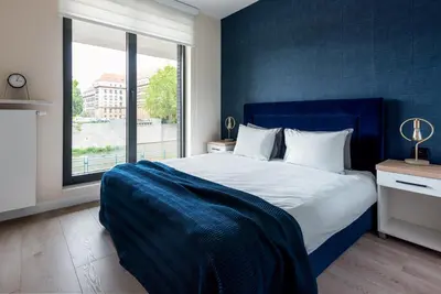Łóżko lub łóżka w pokoju w obiekcie apartamenty-wroc Księcia Witolda