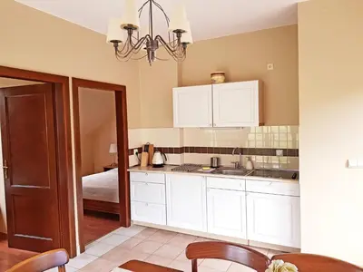 Kuchnia lub aneks kuchenny w obiekcie Apartamenty Dom na Wzgórzu Gardenia