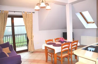 Telewizja i/lub zestaw kina domowego w obiekcie Apartamenty Dom na Wzgórzu Gardenia