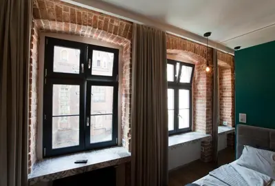Łóżko lub łóżka w pokoju w obiekcie 2/3 APARTMENTS Old Town