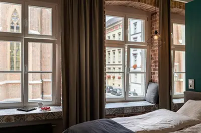 Łóżko lub łóżka w pokoju w obiekcie 2/3 APARTMENTS Old Town