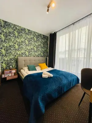 Łóżko lub łóżka w pokoju w obiekcie Boogie Deluxe Old Town