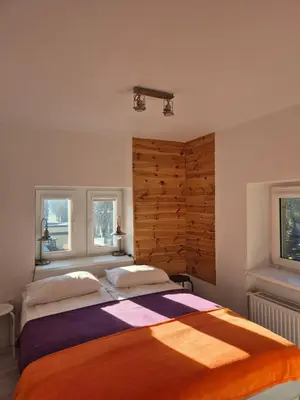 Łóżko lub łóżka w pokoju w obiekcie Kot Pocztowy
