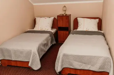 Łóżko lub łóżka w pokoju w obiekcie Motel Łasuch