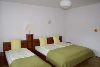Łóżko lub łóżka w pokoju w obiekcie Willa Moja Gawra