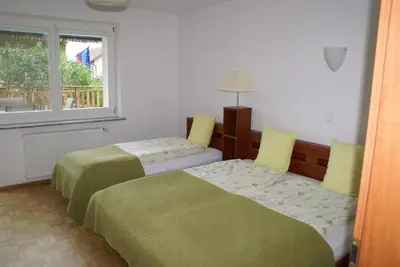 Łóżko lub łóżka w pokoju w obiekcie Willa Moja Gawra