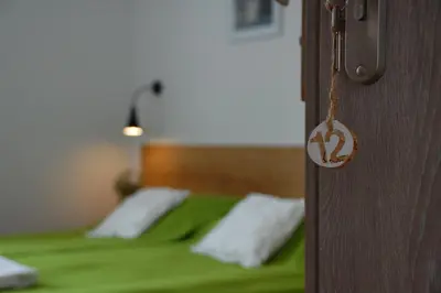 Łóżko lub łóżka w pokoju w obiekcie Willa Rudy