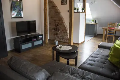 Telewizja i/lub zestaw kina domowego w obiekcie Apartament Przy Rynku