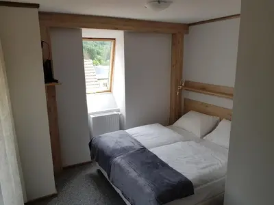 Łóżko lub łóżka w pokoju w obiekcie Villa Nina