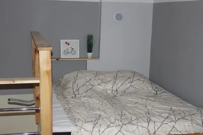 Łóżko lub łóżka w pokoju w obiekcie Apartamenty Górskie