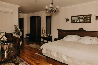 Łóżko lub łóżka w pokoju w obiekcie Oławian Hotel