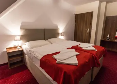 Łóżko lub łóżka w pokoju w obiekcie Noclegi Gawra