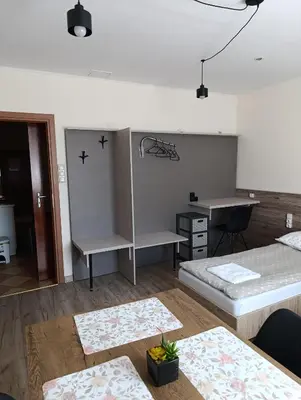 Łóżko lub łóżka w pokoju w obiekcie Noclegi 