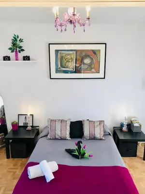 Łóżko lub łóżka w pokoju w obiekcie Mieszkanie w Srodmiesciu blisko rynku