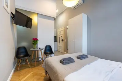 Łóżko lub łóżka w pokoju w obiekcie Wroclaw City Apartments