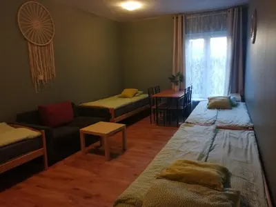 Łóżko lub łóżka w pokoju w obiekcie Hostel Gliwice Centrum PARKING