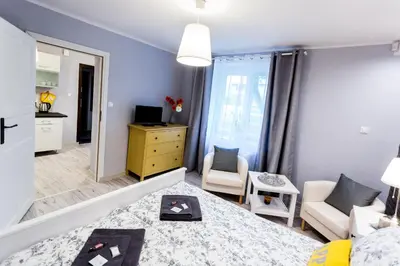 Telewizja i/lub zestaw kina domowego w obiekcie Grey Studio II