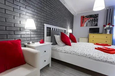 Łóżko lub łóżka w pokoju w obiekcie Grey Studio II