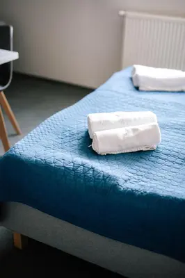 Łóżko lub łóżka w pokoju w obiekcie Pod Sową