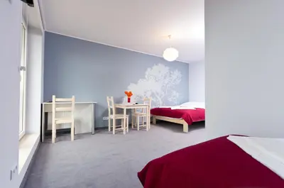 Łóżko lub łóżka w pokoju w obiekcie Cilantro Bed & Breakfast